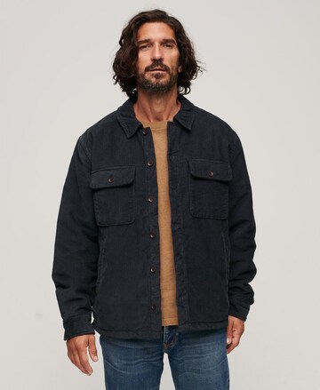 Veste mi-saison Superdry en bleu : devant