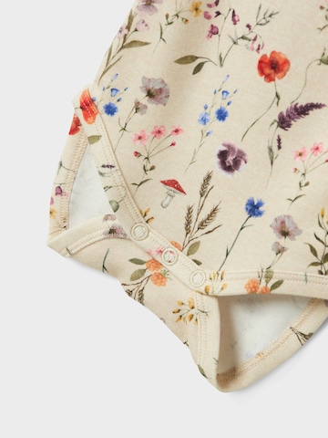 Barboteuse / body 'NBFLUXA' NAME IT en beige