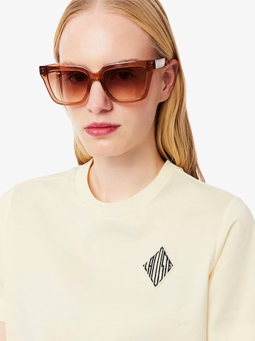 Maglietta di LACOSTE in giallo