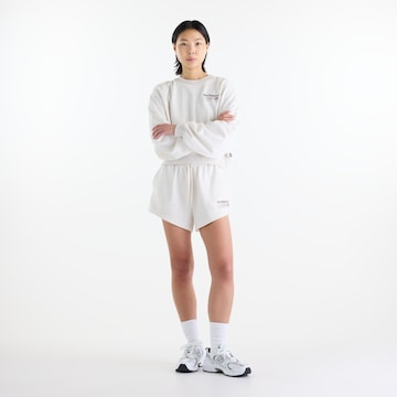 Loosefit Pantaloni 'Trackside' di new balance in beige: frontale