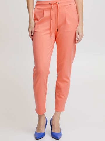 Slimfit Pantaloni con pieghe 'Rizetta' di b.young in arancione: frontale