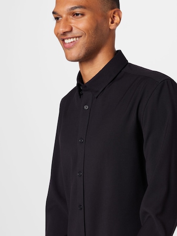 Coupe regular Chemise 'LOKEN' DRYKORN en noir