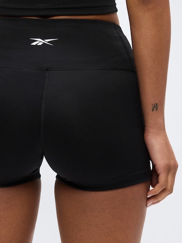 Reebok Skinny Sportbyxa 'ID TRAIN' i svart