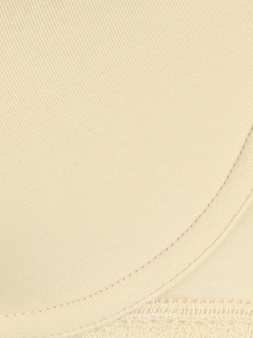 Dorina T-Shirt Rintaliivi 'CALI' värissä beige