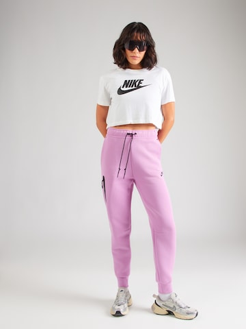 Tapered Pantaloni 'TCH FLC' di Nike Sportswear in rosa