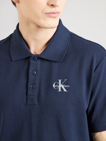 Tricou de la Calvin Klein Jeans pe albastru