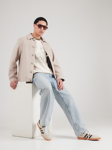 GUESS Shirt 'NO PLAN TO LEAVE' in Beige