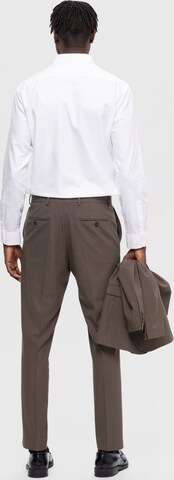 SELECTED HOMME Regular Trousers with creases 'Liam' in Green