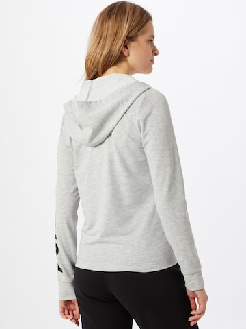 PUMA - Sudadera con cremallera deportiva en gris