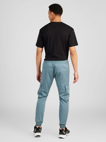 Calvin Klein Jeans Alt kitsenev Klapptaskutega püksid, värv sinine