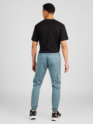 Calvin Klein Jeans - Tapered Calças cargo em azul