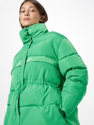 co'couture Kurtka zimowa 'Mountain' w kolorze zielony