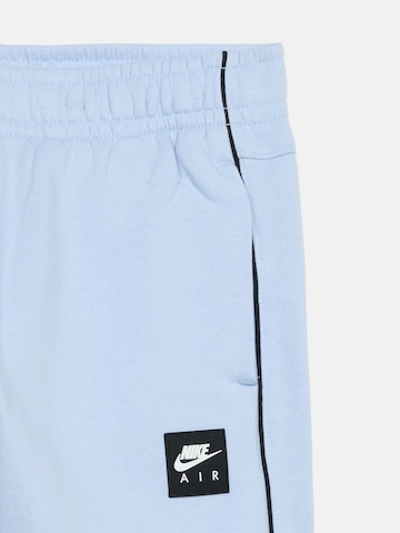 Nike Sportswear - Tapered Pantalón 'AIR' en azul