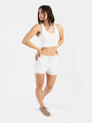 Skinny Pantaloni sportivi di Spyder in bianco