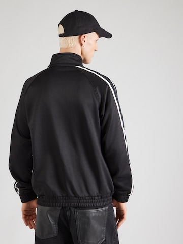 Carhartt WIP - Sudadera con cremallera 'Bolar' en negro