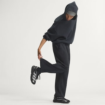 ADIDAS SPORTSWEAR - Loosefit Calças de desporto em preto