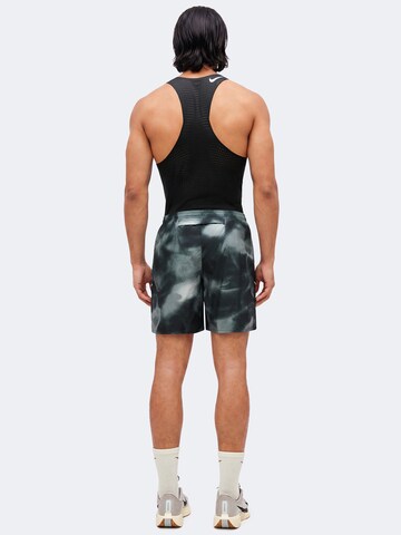 NIKE Regular Sportbroek 'Miler' in Zwart