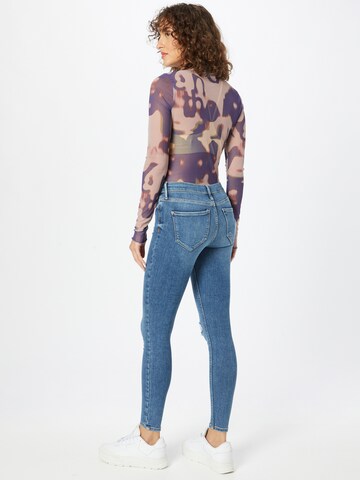 River Island Skinny Jeans 'MOLLY HERMAN' in Blau