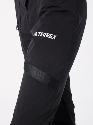 ADIDAS TERREX Slimfit Outdoor hlače 'Xperior' | črna barva