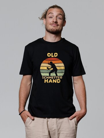 T-Shirt 'Old Schmetterhand' Watapparel en noir : devant