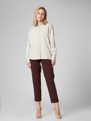 Guido Maria Kretschmer Women Regular Trousers with creases 'Stina' in Brown
