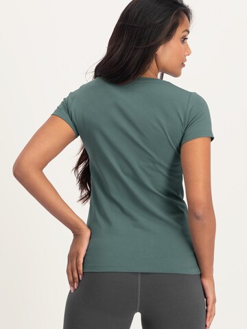 Urban Goddess Yoga & Activewear Sporttop 'Hamsa Core Yoga & Pilates' in Grün