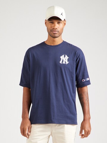 Champion Authentic Athletic Apparel - Camisa em azul: frente