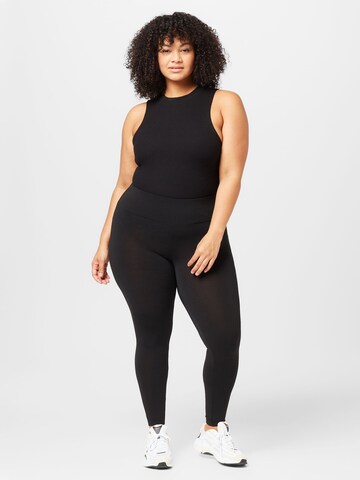 EVOKED Skinny Leggings in Black