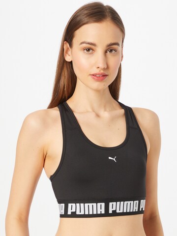 PUMA Bralette Sports Bra in Black: front