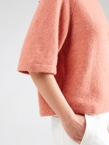 & Other Stories - Jersey en naranja