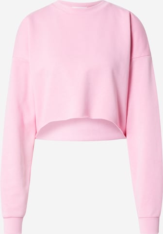 Hoermanseder x About You Sweatshirt 'Tessy' in Pink: front