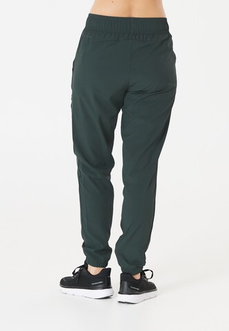ENDURANCE Tapered Sports trousers 'Chaya' in Green