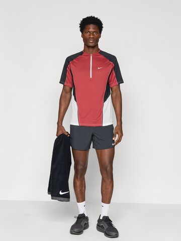 NIKE Performance shirt 'RETRO' in Red
