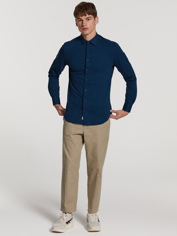 mėlyna Shiwi Priglundantis modelis Marškiniai 'Pablo'
