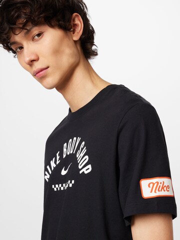 T-Shirt fonctionnel NIKE en noir