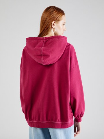 LEVI'S ® Sweatshirt 'Graphic Caravan Hoodie' i röd