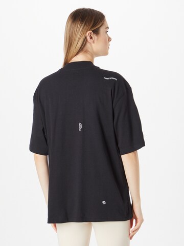 ADIDAS SPORTSWEAR Sportshirt 'friend With Healing Crystals Inspired Graphics' in Schwarz