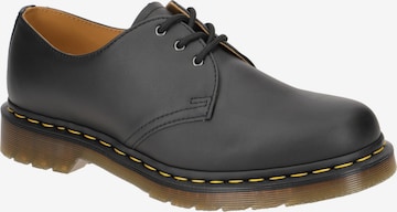 Chaussure à lacets Dr. Martens en noir : devant