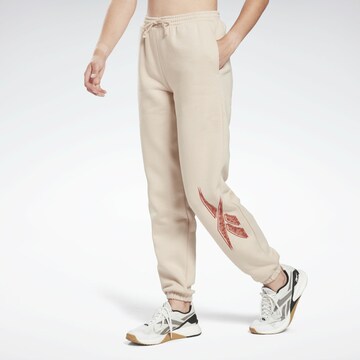 Reebok Tapered Sportbroek 'Modern Safari' in Beige: voorkant