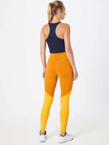 Reebok Skinny Sportbroek in Oranje