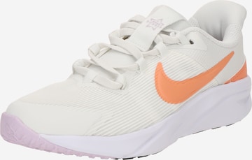 NIKE - Calzado deportivo 'Star Runner 4' en blanco: frente