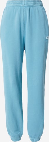 Reebok Tapered Sportbroek in Blauw: voorkant