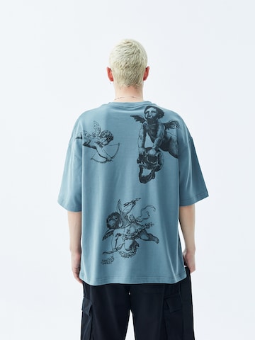 Tricou 'Rochester' de la VAMOS CLO pe albastru