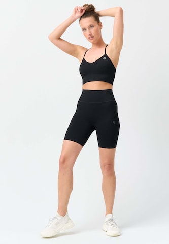 OCEANSAPART Slim fit Workout Pants 'Maya' in Black: front