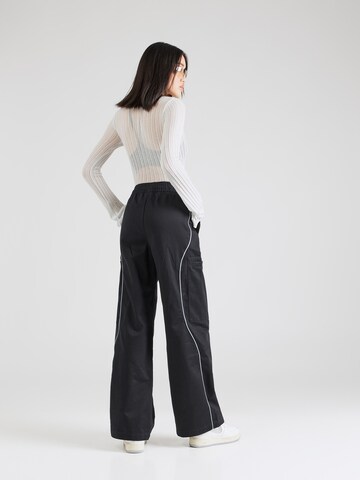 Nike Sportswear Wide leg Broek 'STREET' in Zwart