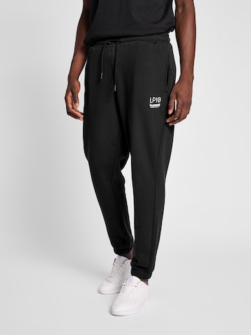 Hummel Tapered Pants in Black: front