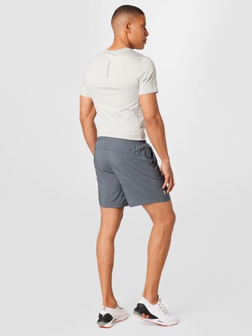 UNDER ARMOUR Regular Workout Pants 'Speed Stride 7' in Grey