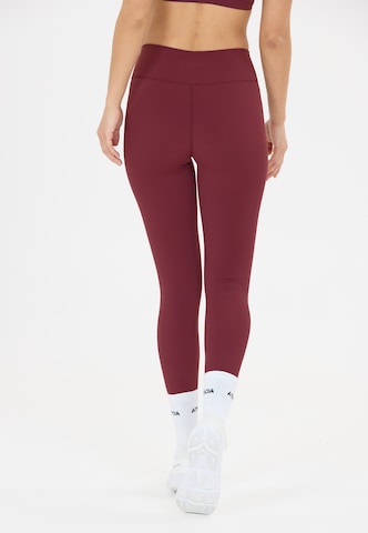 Athlecia Skinny Workout Pants 'Blossom' in Red