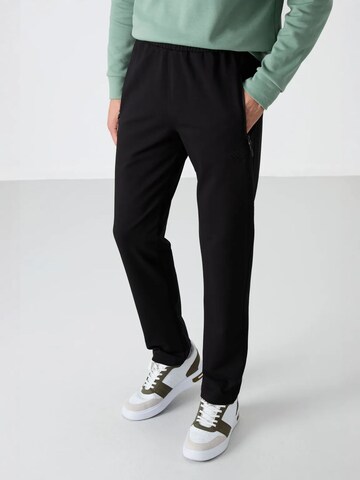 regular Pantaloni di Tommy Life in nero: frontale