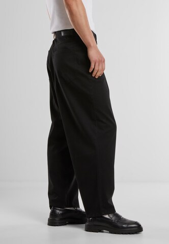 Urban Classics Regular Tapered Twill Baggy Pants ' ' in Schwarz
